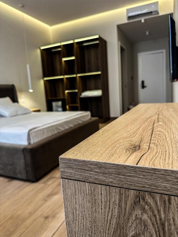 Postel nebo postele na pokoji v ubytování ALEXANDER Rooms