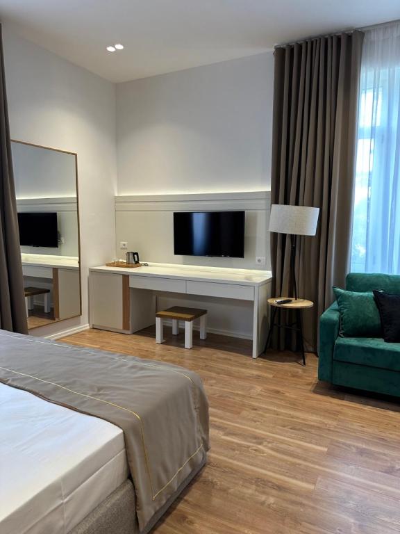 Postel nebo postele na pokoji v ubytování HEIRESS Hotel