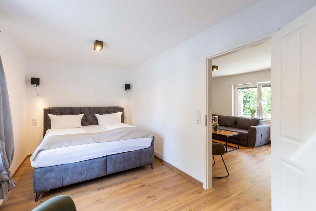 Postel nebo postele na pokoji v ubytování Hotel BUTZ
