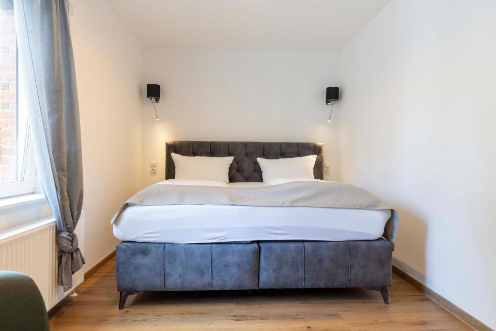 Postel nebo postele na pokoji v ubytování Hotel BUTZ
