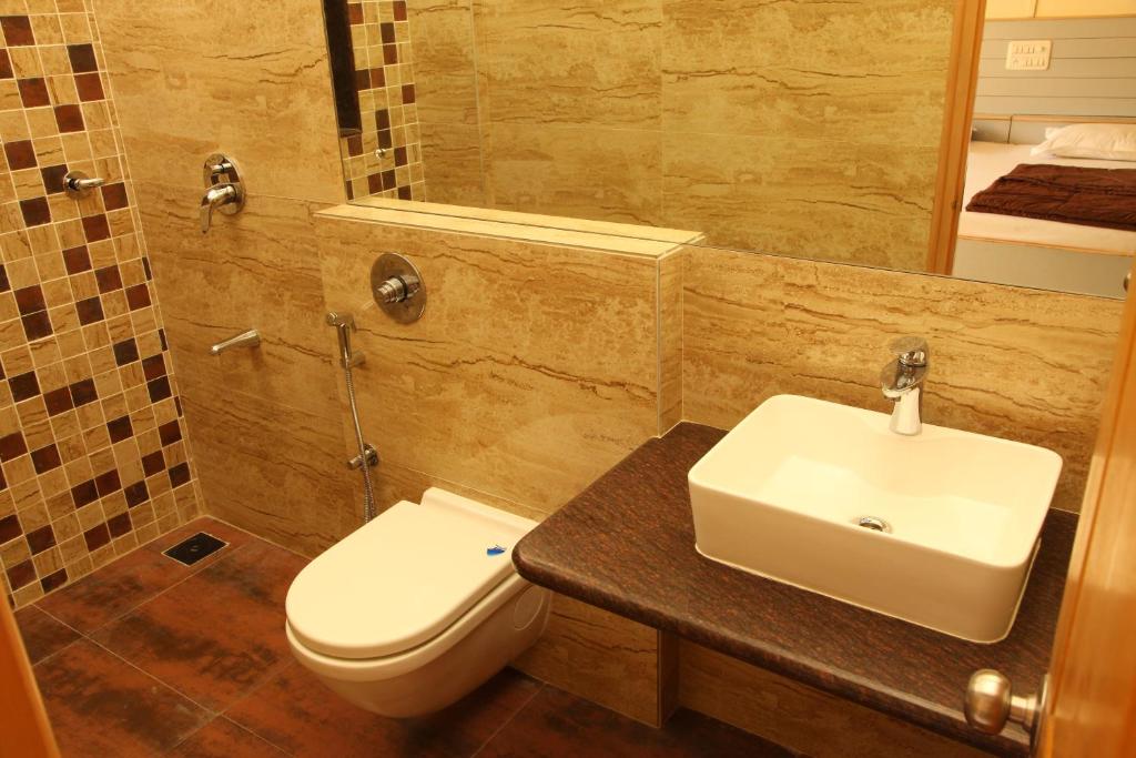 Koupelna v ubytování Hotel Ravikiran Alibaug