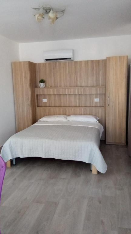 Postel nebo postele na pokoji v ubytování Casa Pizzarelli