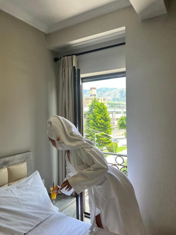 Uma cama ou camas num quarto em Hotel Pazari & Apartments