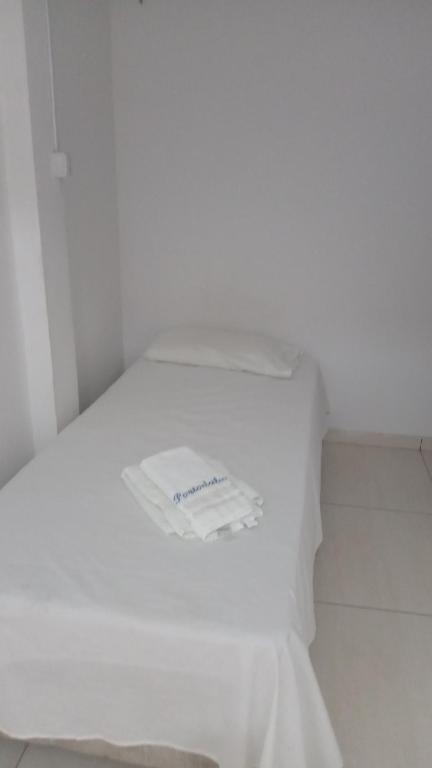 Postel nebo postele na pokoji v ubytování Hotel Porto da Lua Belém