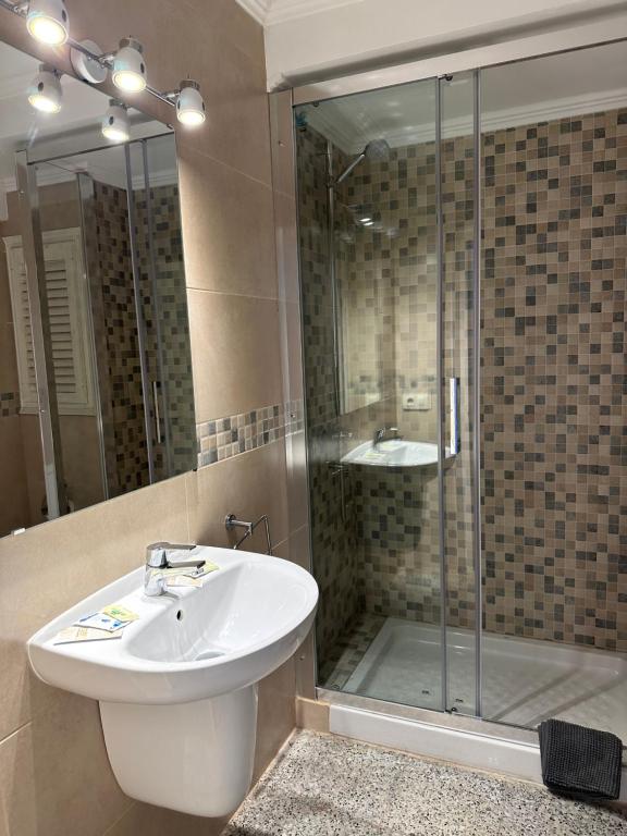 Koupelna v ubytování L'Illa Hotel