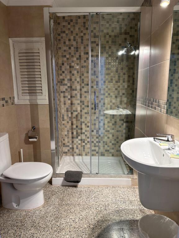 Koupelna v ubytování L'Illa Hotel
