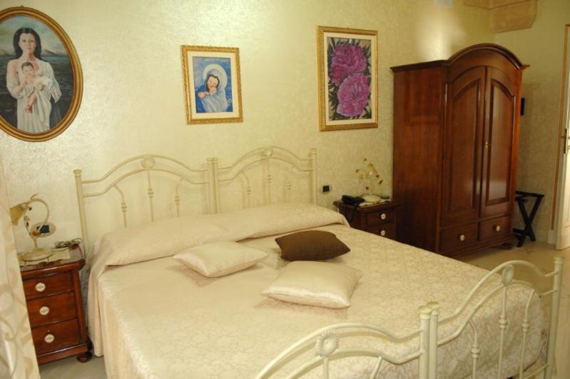 Krevet ili kreveti u jedinici u objektu BED AND BREAKFAST SANTA LUCIA