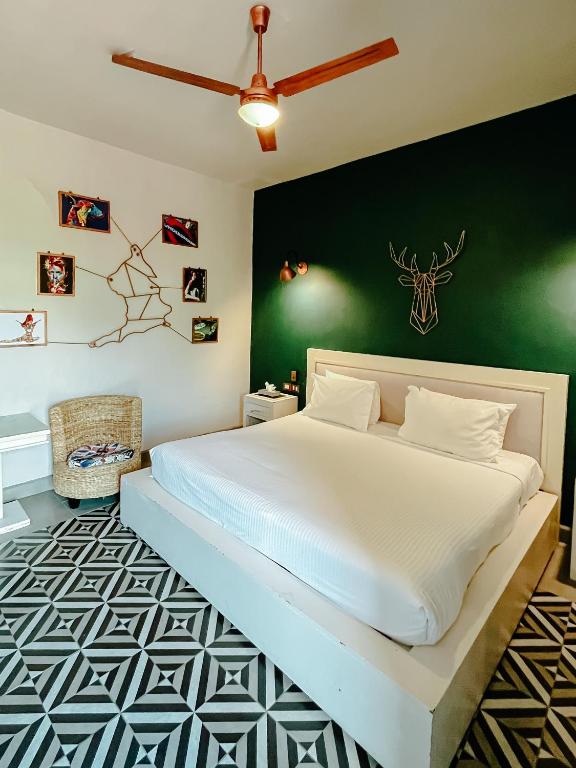 Postel nebo postele na pokoji v ubytování Hotel Del Portal San Miguel de Allende