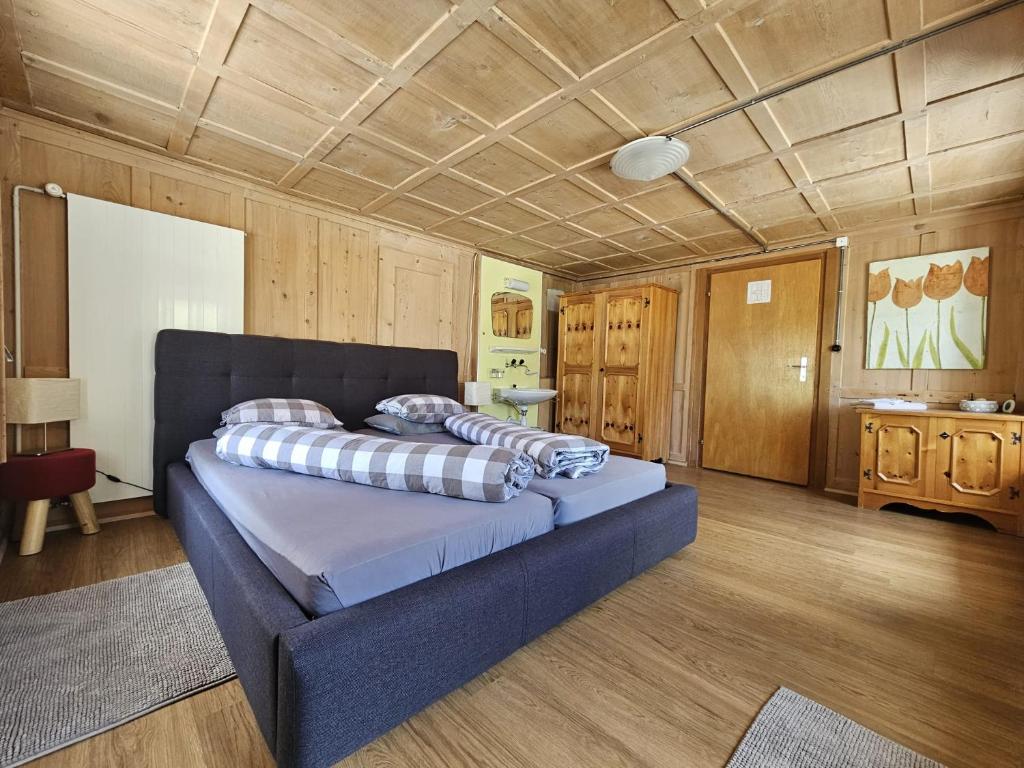 Postel nebo postele na pokoji v ubytování Hotel Dalla Posta Platta