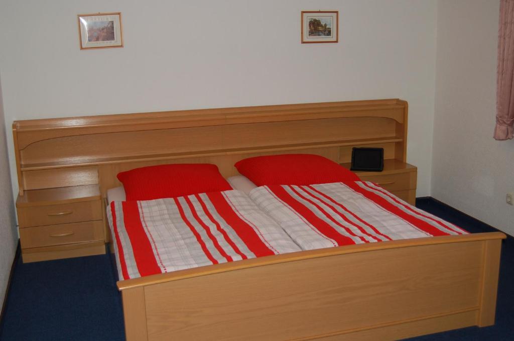 Postel nebo postele na pokoji v ubytování Hotel am Weißdornbusch