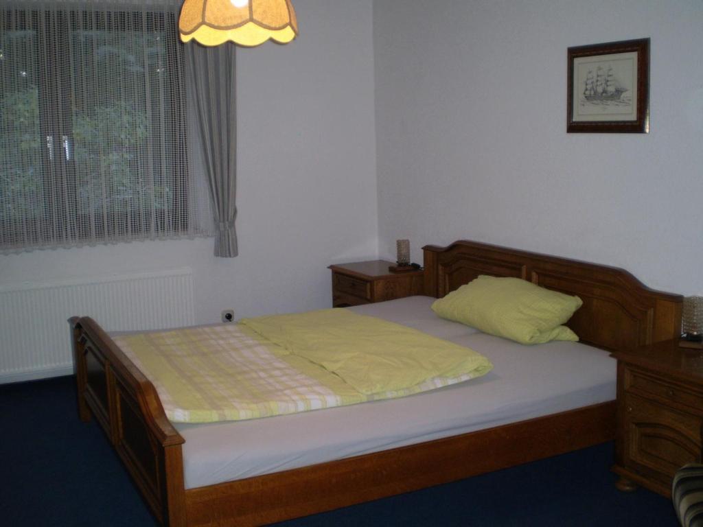 Postel nebo postele na pokoji v ubytování Hotel am Weißdornbusch
