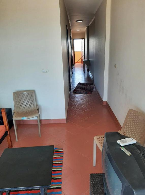 A seating area at Porto Residence Chalet, Outside Marina Gate 3, Sahel North Coast For Rent - شاليه بورتورسيدنس بخارج بوابة 3 مارينا الساحل الإيجار