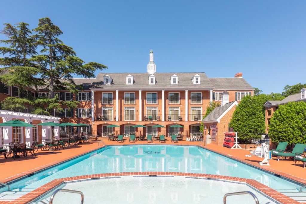 a large swimming pool in front of a large building at Westgate Historic Williamsburg Resort in Williamsburg
