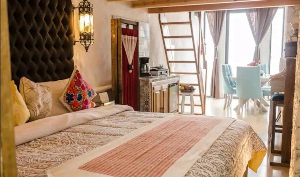Postel nebo postele na pokoji v ubytování Villas del Sol