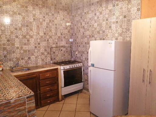 Kuchyň nebo kuchyňský kout v ubytování Villas del Sol