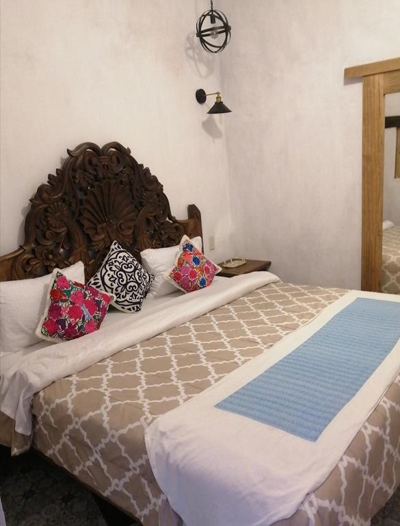 Postel nebo postele na pokoji v ubytování Villas del Sol
