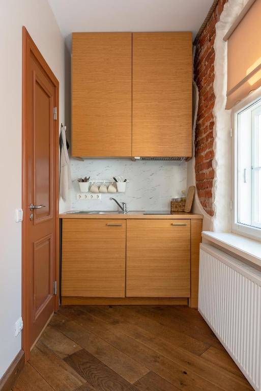 Kuchyň nebo kuchyňský kout v ubytování Rüütli Apartments in Tartu Old Town