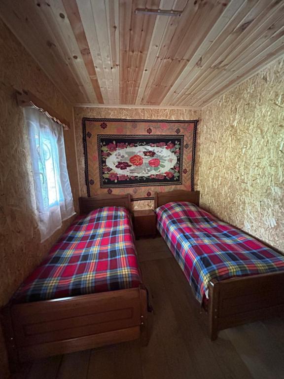 Letto o letti in una camera di Shio's Stonehouse in Tusheti