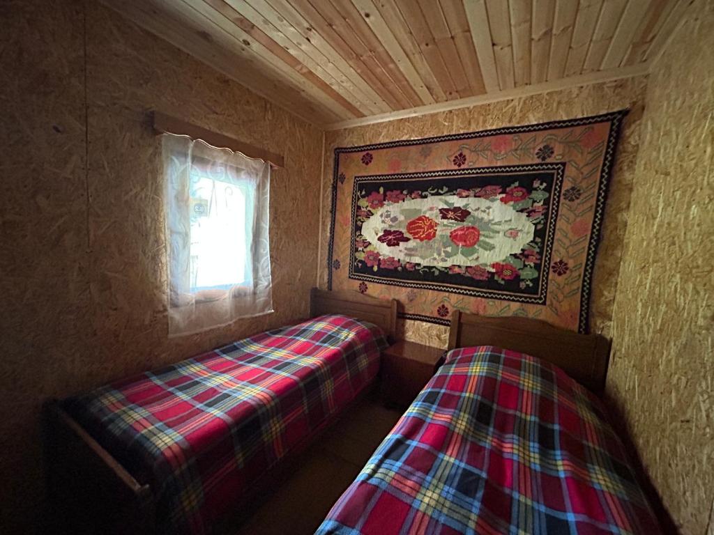 Letto o letti in una camera di Shio's Stonehouse in Tusheti