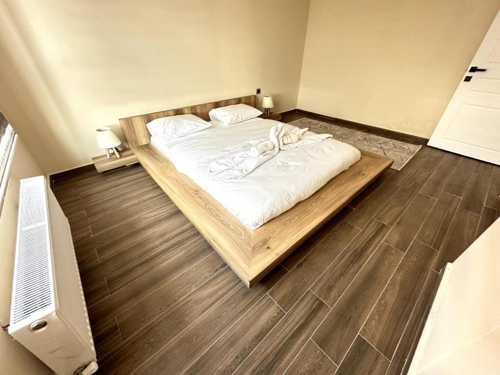 Postel nebo postele na pokoji v ubytování THE SUİT Residence Daire