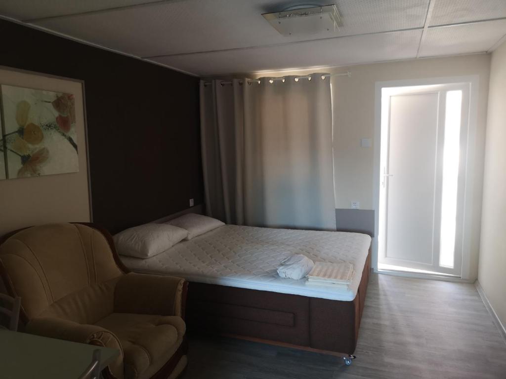 Postel nebo postele na pokoji v ubytování Bolek apartmany