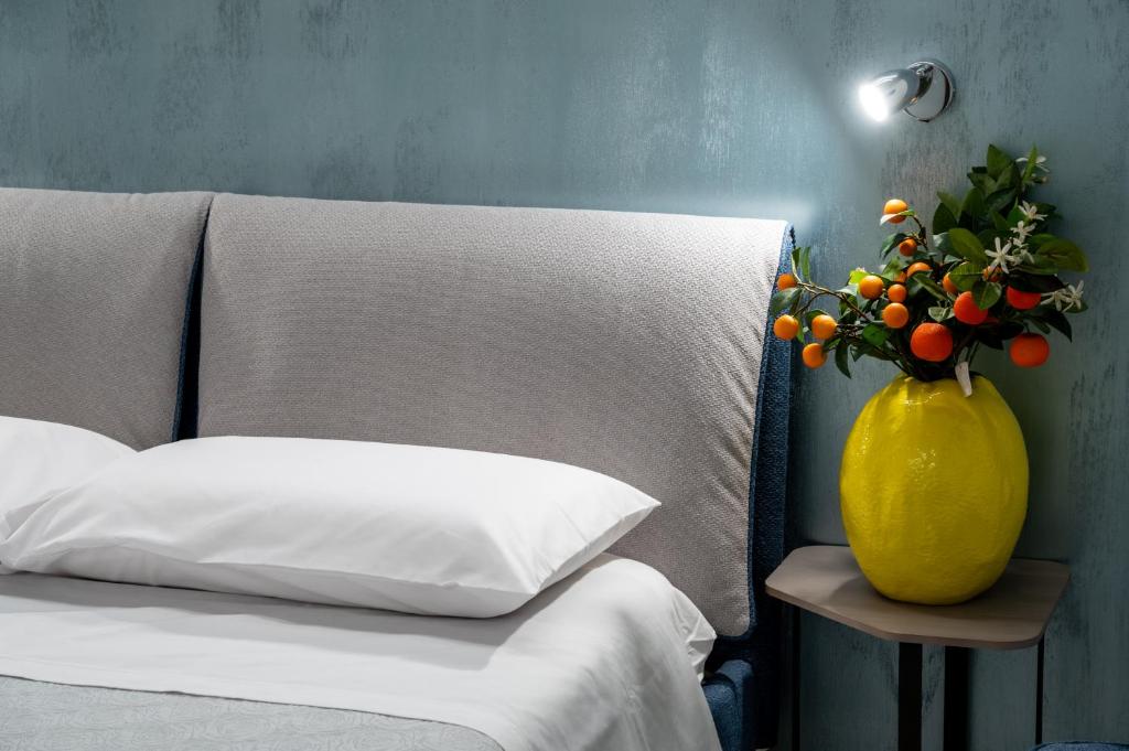 Postel nebo postele na pokoji v ubytování B&B BISCEGLIE