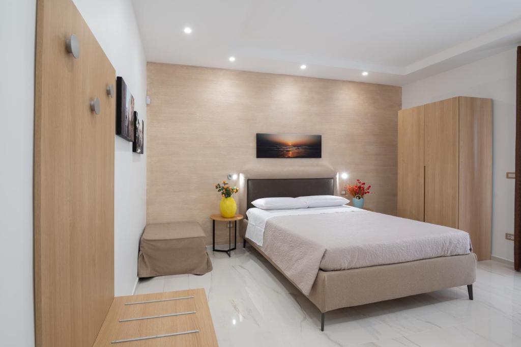 Postel nebo postele na pokoji v ubytování B&B BISCEGLIE