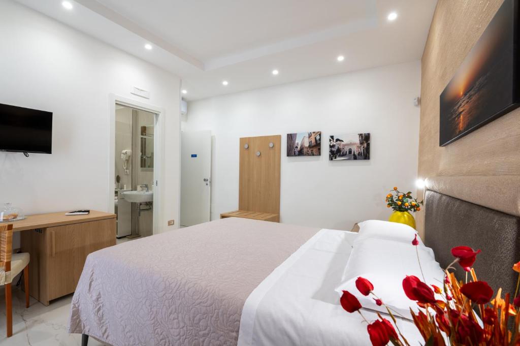 TV a/nebo společenská místnost v ubytování B&B BISCEGLIE