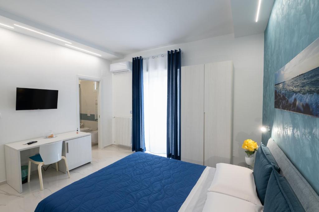 Postel nebo postele na pokoji v ubytování B&B BISCEGLIE