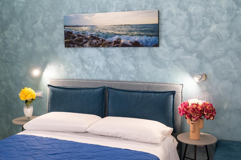 Postel nebo postele na pokoji v ubytování B&B BISCEGLIE