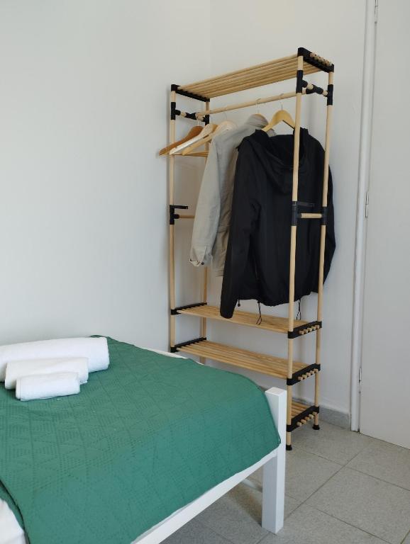 Postel nebo postele na pokoji v ubytování Thea Nisaki Mochlos