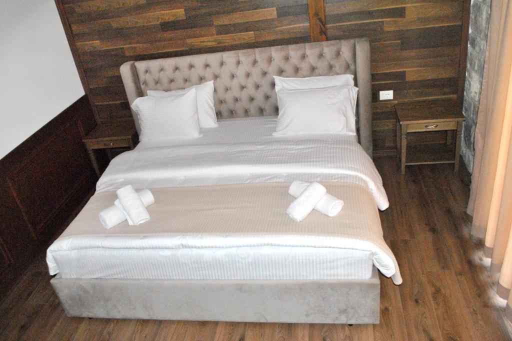 Postel nebo postele na pokoji v ubytování Boutique Vila FIDANI