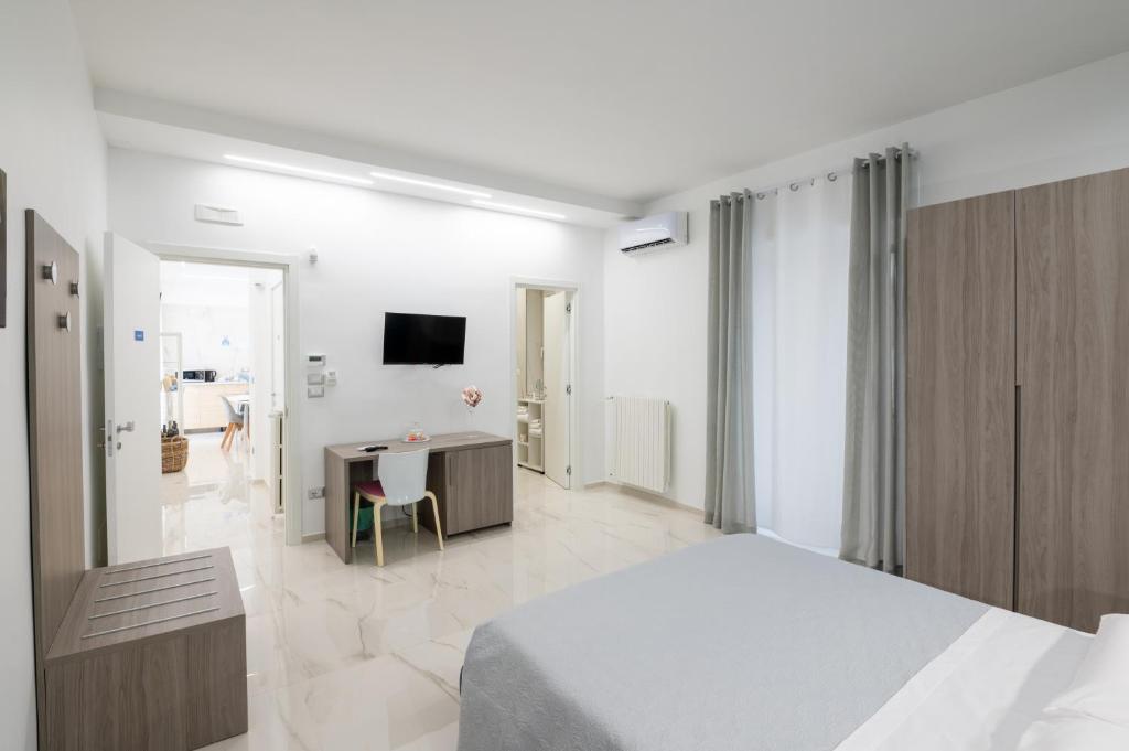 TV a/nebo společenská místnost v ubytování B&B BISCEGLIE