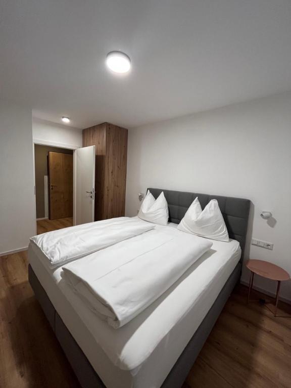 Postel nebo postele na pokoji v ubytování Villa Turnersee