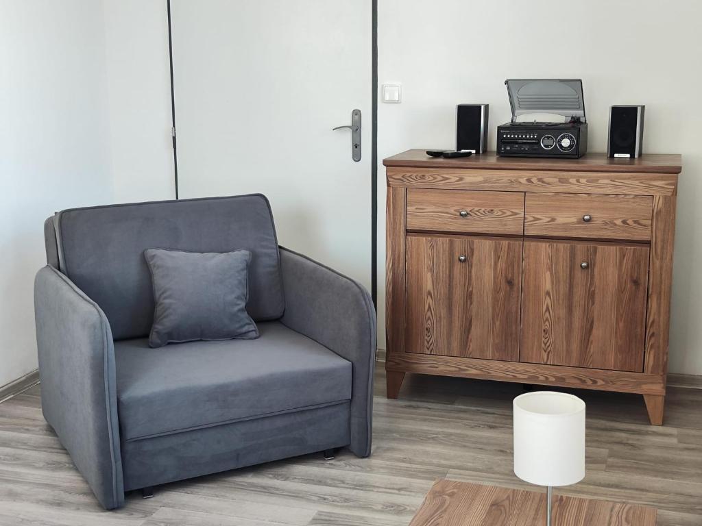 Televiisor ja/või meelelahutuskeskus majutusasutuses Apartmány Goliáš