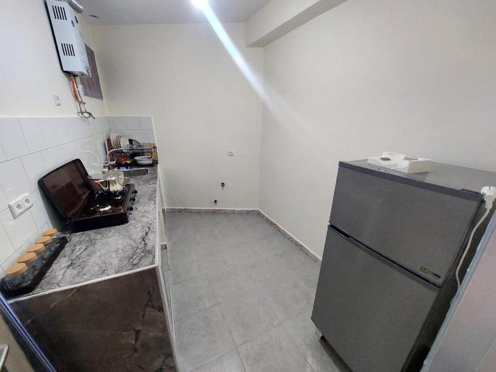 Kuchyň nebo kuchyňský kout v ubytování Breeze apart - 2 facade & WiFi
