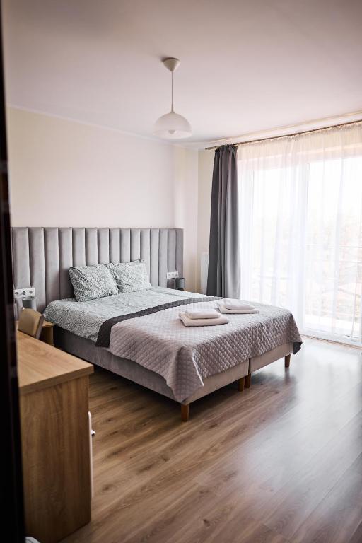 Postel nebo postele na pokoji v ubytování Villa Lima