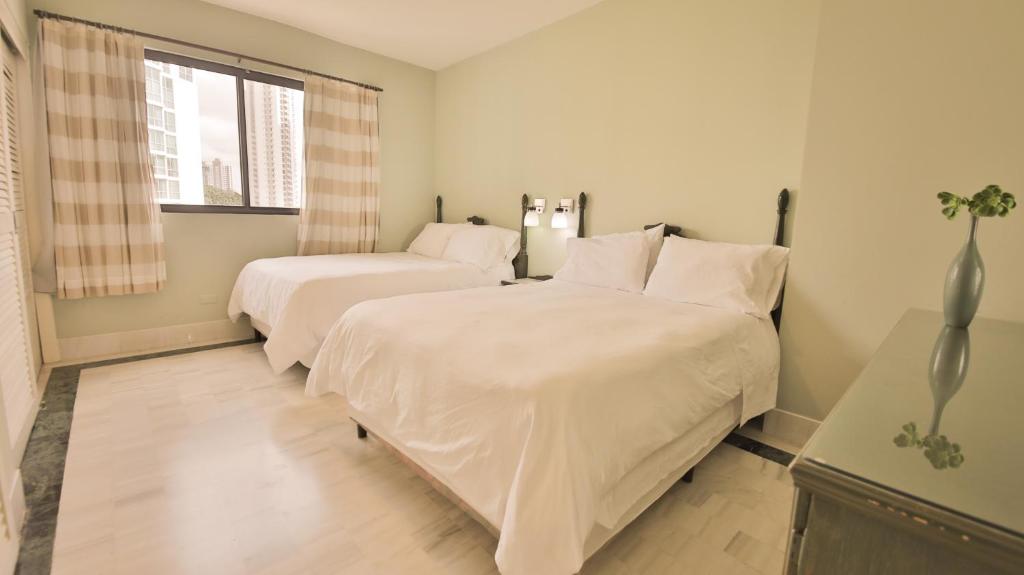 Postel nebo postele na pokoji v ubytování Torres de Alba Hotel & Suites