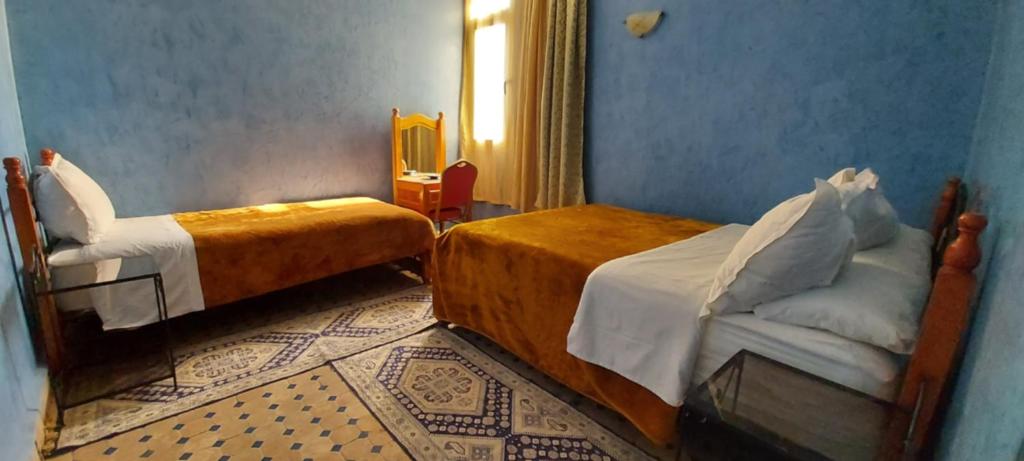 Postel nebo postele na pokoji v ubytování Hotel Marmar