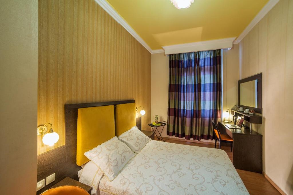 Letto o letti in una camera di Delphi Art Hotel by Prima Hotels