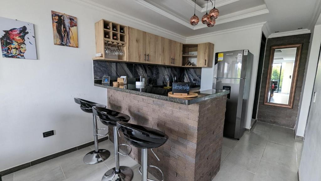 Kuchyň nebo kuchyňský kout v ubytování Apto lujo con jacuzzi y parqueadero piso 4