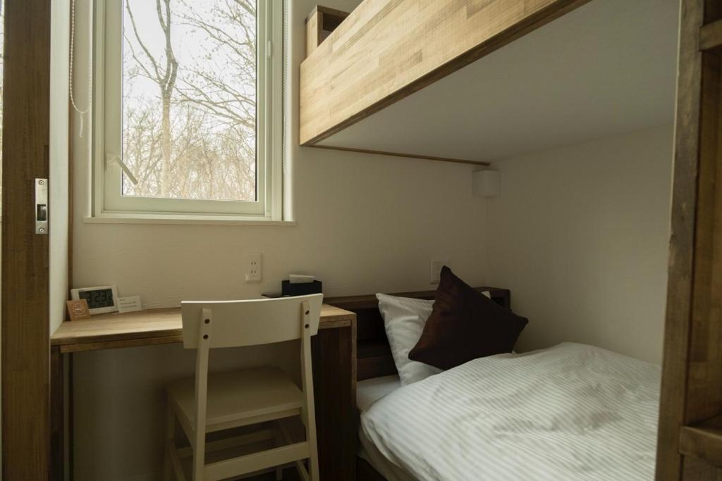 Un pat sau paturi într-o cameră la HOTEL BOTH - Vacation STAY 90935v