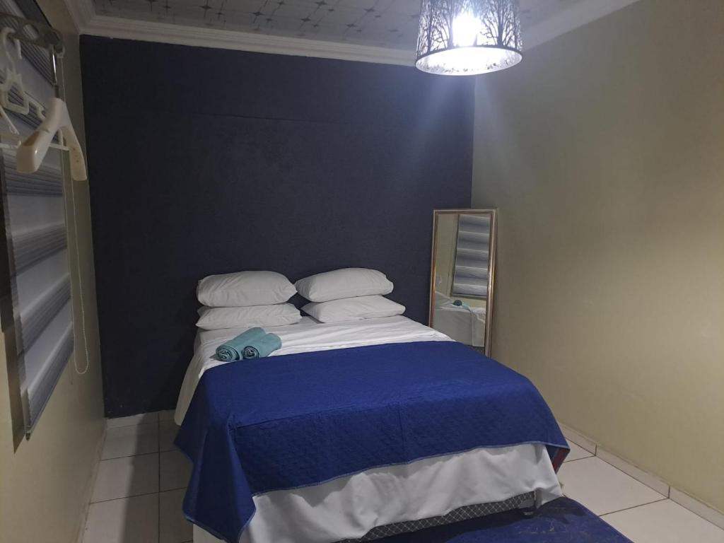 Postel nebo postele na pokoji v ubytování Queen Light