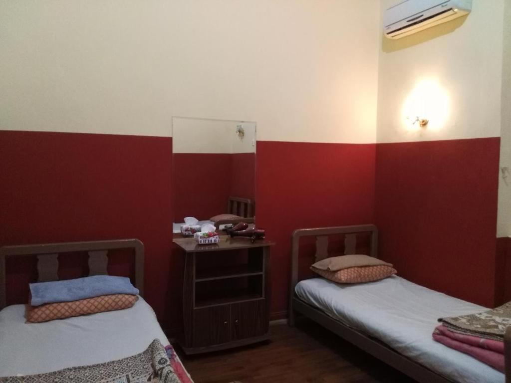 Postel nebo postele na pokoji v ubytování Safary Hotel