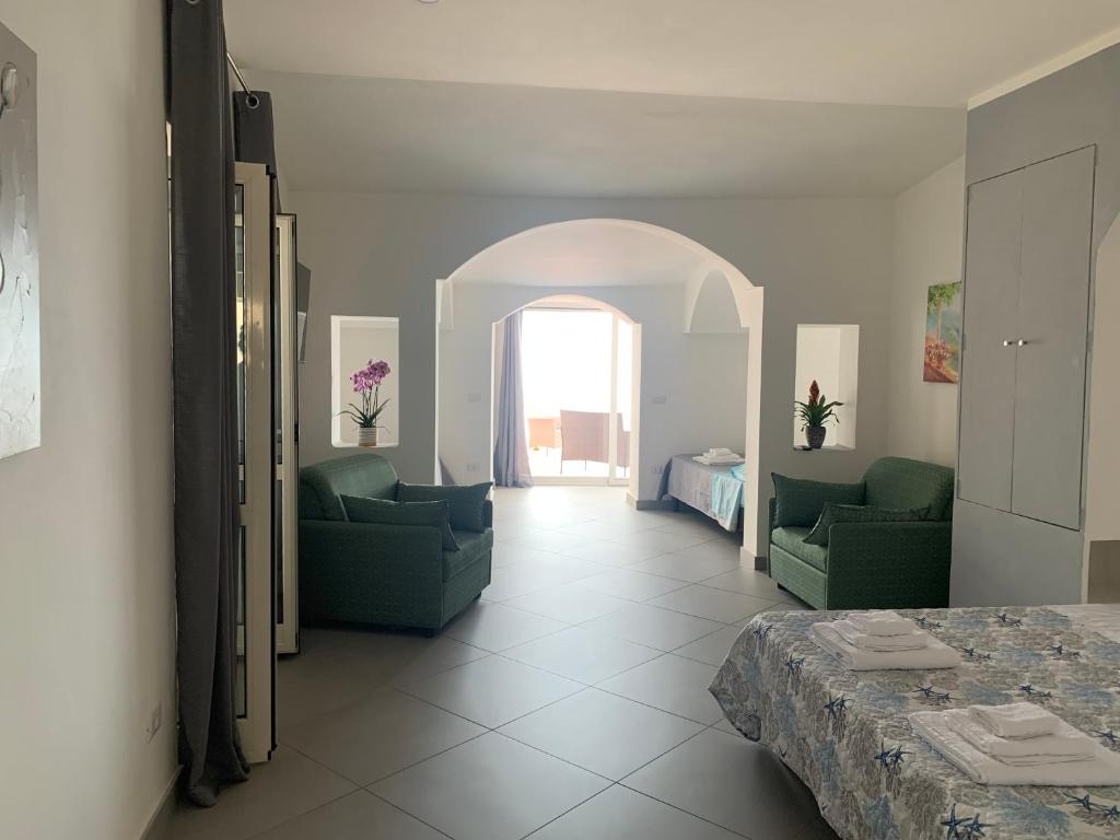 A bed or beds in a room at Matarazzo Rooms