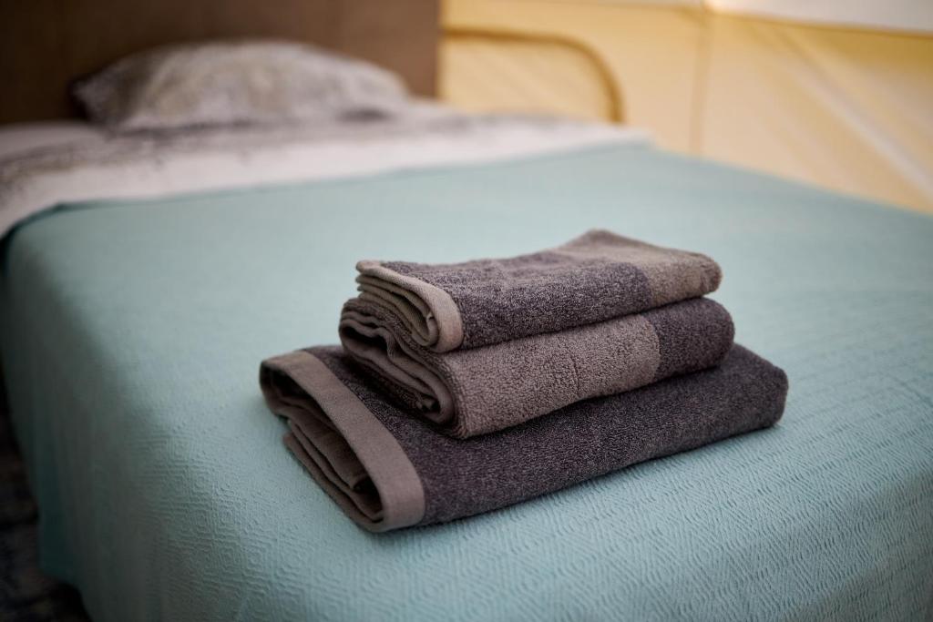 Postel nebo postele na pokoji v ubytování glamping Shangri la