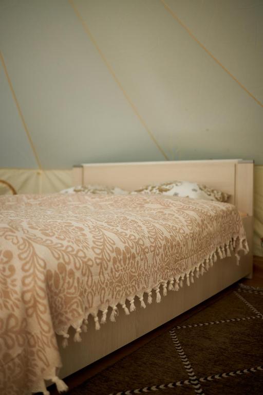Postel nebo postele na pokoji v ubytování glamping Shangri la