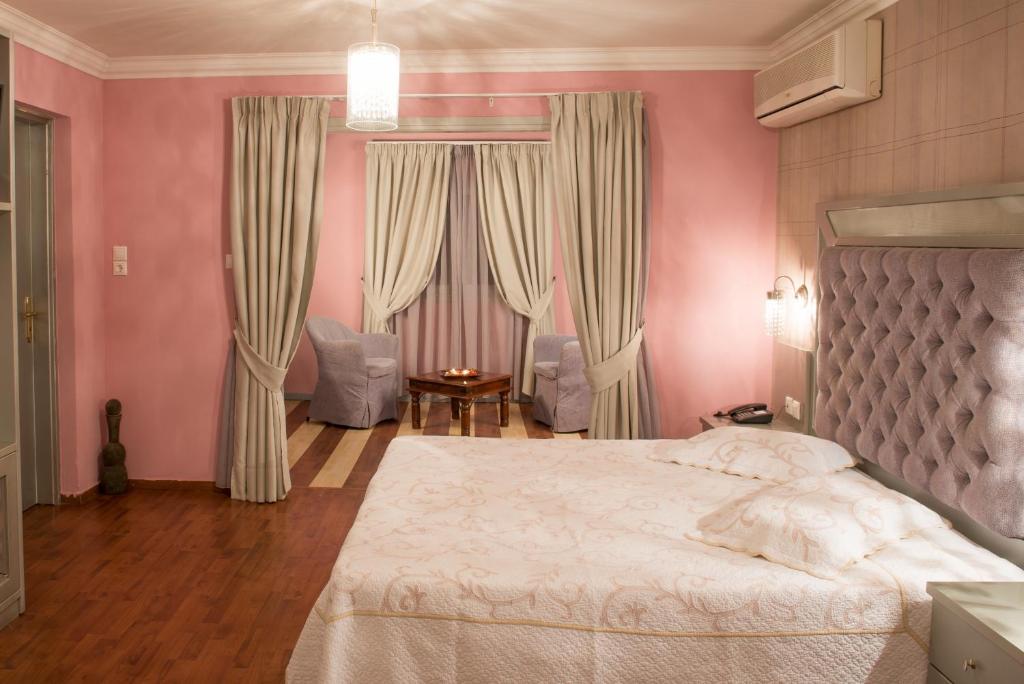 Letto o letti in una camera di Delphi Art Hotel by Prima Hotels