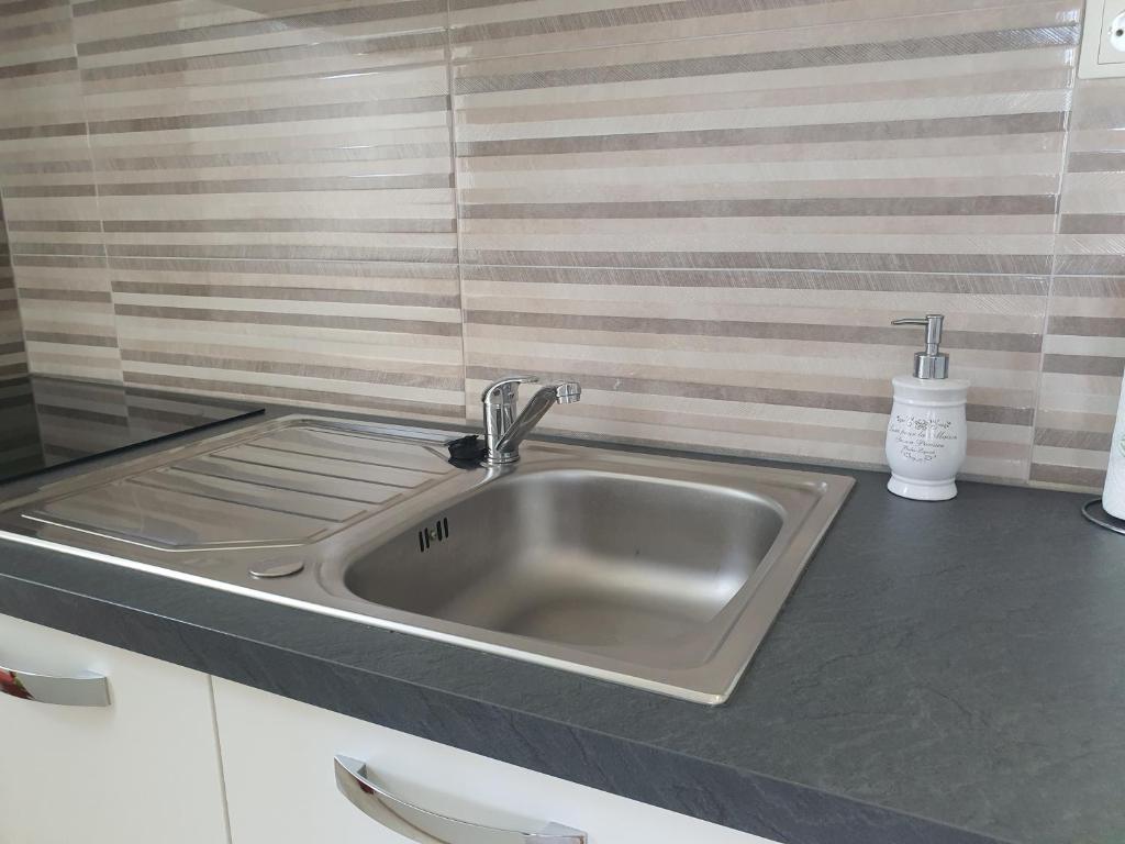 Kuchyňa alebo kuchynka v ubytovaní Apartment Radoš