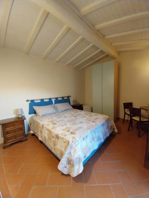 Ένα ή περισσότερα κρεβάτια σε δωμάτιο στο Casa di Dorothy stanza vicino a Firenze